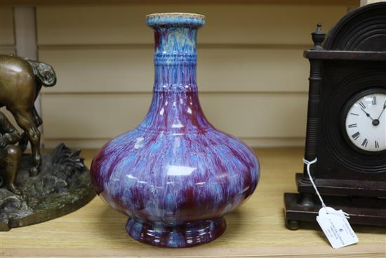 A Chinese famille rose crackleglaze vase and a Jun type vase tallest 34cm